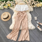 Alkalmi női overall csipkével és derékövvel