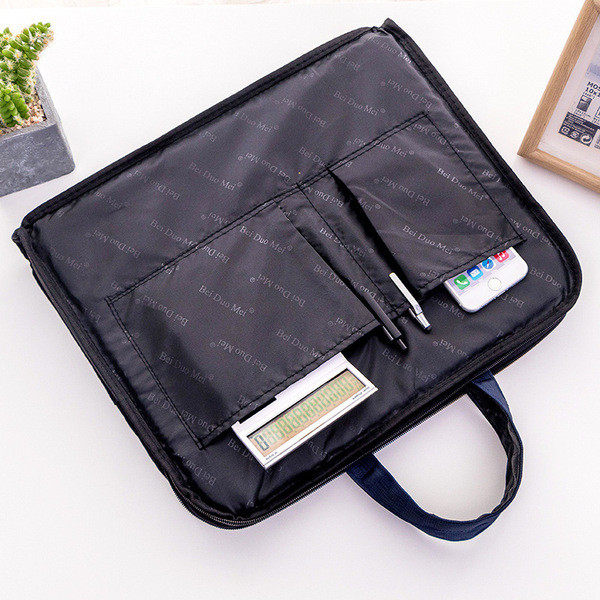 Embleemi ja lühikeste sangadega sülearvutikott