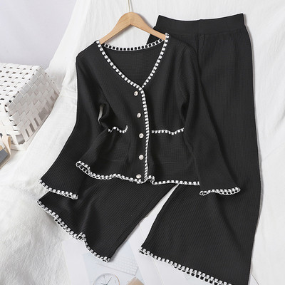 Moteriškas dviejų dalių komplektas - liemenė ir plačios kelnės