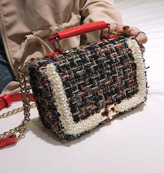 Naiste tekstiilist kott metallist sanga ja pärli kaunistusega