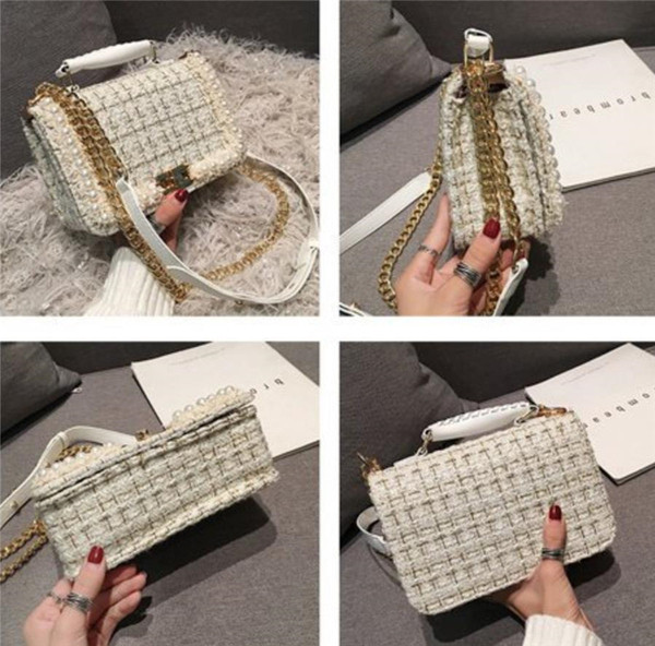 Naiste tekstiilist kott metallist sanga ja pärli kaunistusega