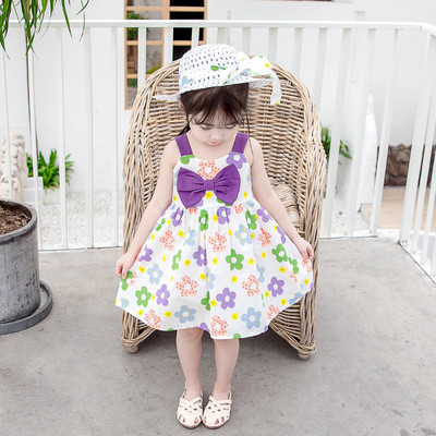 Paela ja lillemotiividega laste suvekleit