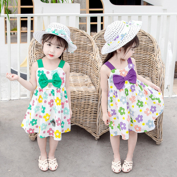 Paela ja lillemotiividega laste suvekleit