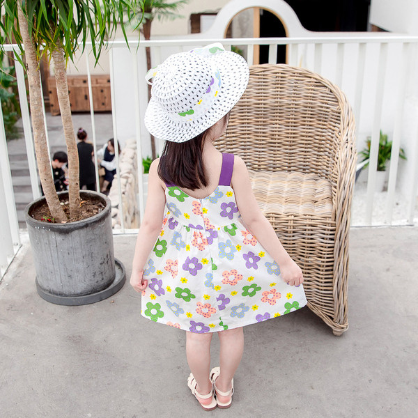 Paela ja lillemotiividega laste suvekleit