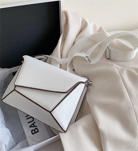 Moderni asimetriškos formos rankinė ant pečių