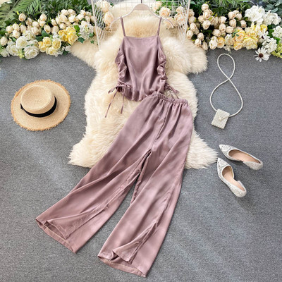 Női alkalmi szett nyakkendős felsővel és széles nadrággal