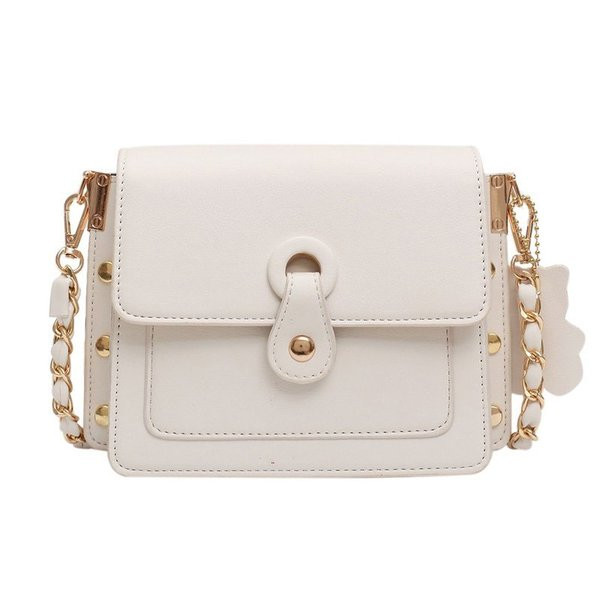 Modern női táska lyukakkal és hosszú füllel