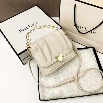 Női kis táska fém díszítéssel