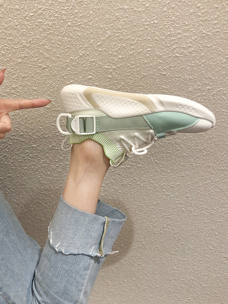 Textilből készült, fűzős női sportcipő