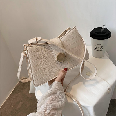 Retro stílusú női bőrtáska hosszú fogantyúval