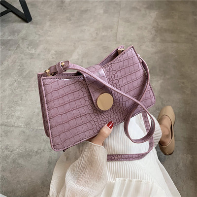 Retro stílusú női bőrtáska hosszú fogantyúval