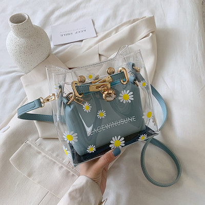 Stílusos kézitáska virágokkal és hosszú fogantyúval