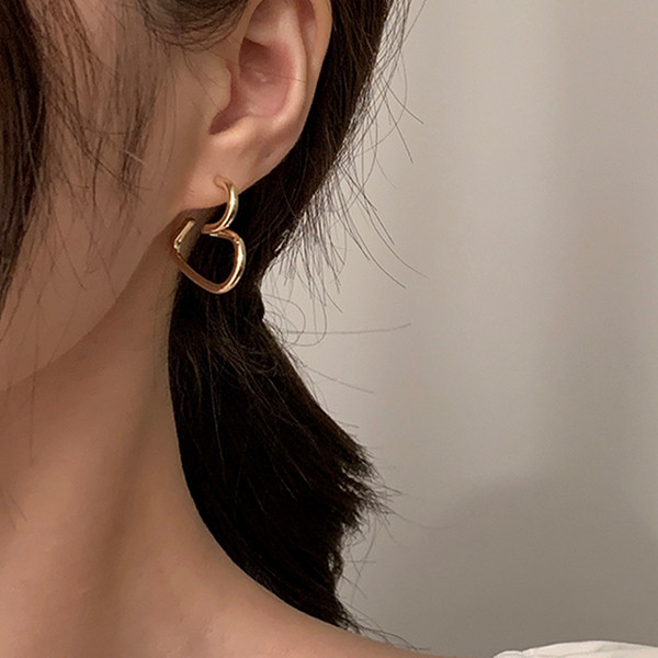 Női arany fülbevaló szív alakú