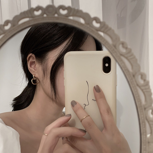 Női arany fülbevaló szív alakú