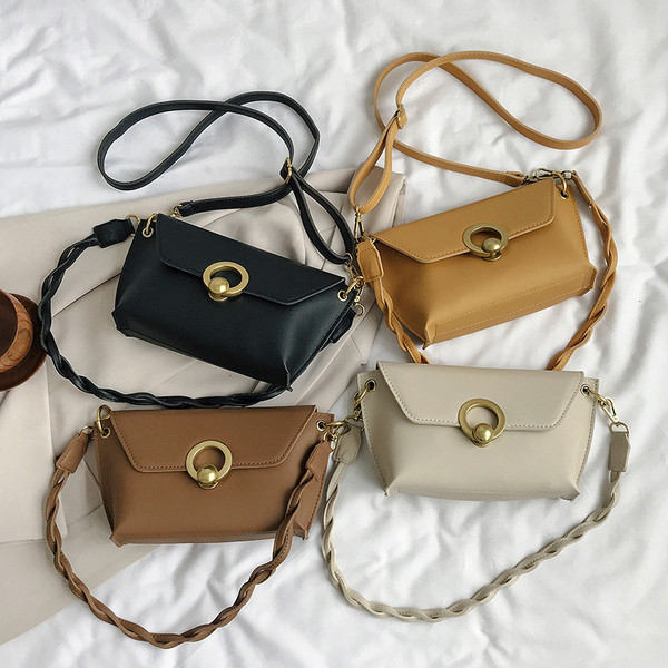 Elegantna ženska torba od eko kože sa kopčom