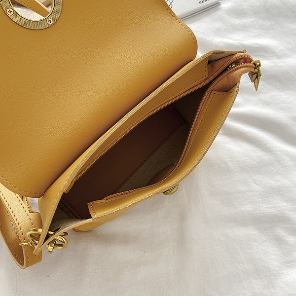 Elegantna ženska torba od eko kože sa kopčom