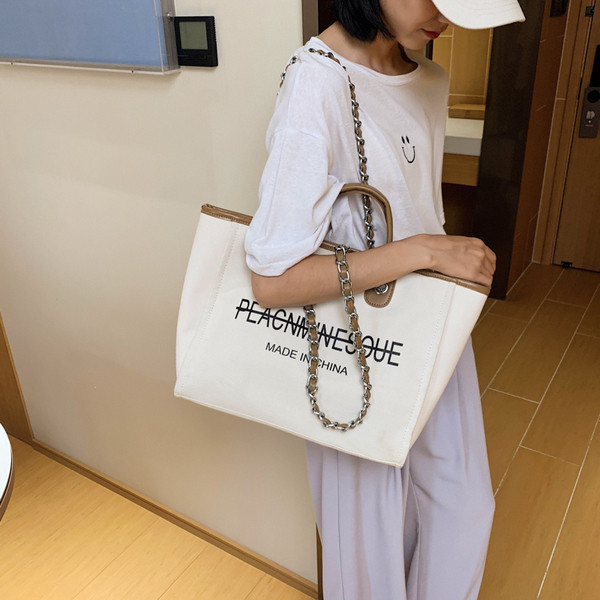 Moderna ženska torba s kratkom i dugom ručkom široki model