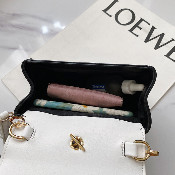 Moderna ženska mini torba s dugom ručkom