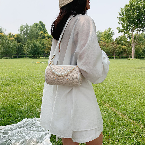 Stílusos női mini táska dekorgyöngyökkel