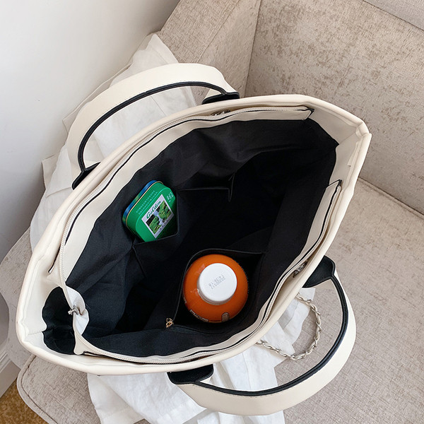 Modern női táska széles modell