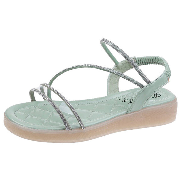 Női szandál lapos talppal és keresztpánttal