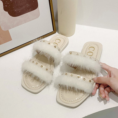 Modern női papucs lapos talppal és pehellyel