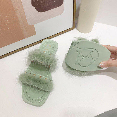 Modern női papucs lapos talppal és pehellyel