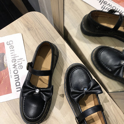 Ženske cipele s ravnim potplatom i trakom