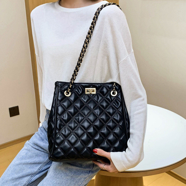 Svakodnevna ženska torba s dugom ručkom i kopčom