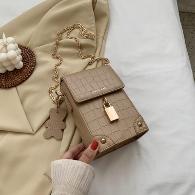 Napi női táska hosszú füllel és fűzőlyukakkal