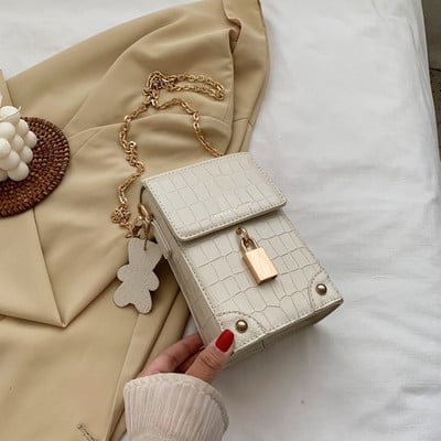 Napi női táska hosszú füllel és fűzőlyukakkal