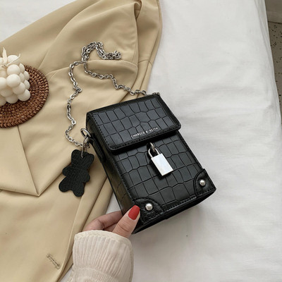 Napi női táska hosszú füllel és fűzőlyukakkal