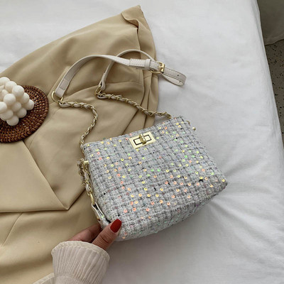 Moderna ženska torba sa šljokicama i kopčom