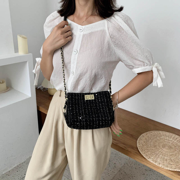 Moderna ženska torba sa šljokicama i kopčom