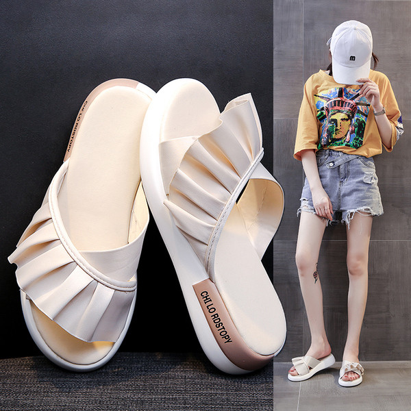 Modern női papucs eco bőr fürtökkel