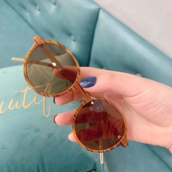 Moderne okrugle sunčane naočale u smeđoj boji