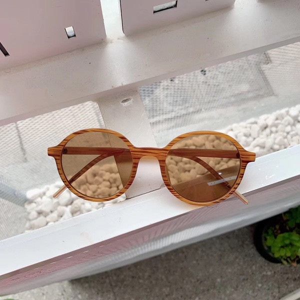 Moderne okrugle sunčane naočale u smeđoj boji