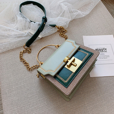 Κομψή γυναικεία τσάντα με αγκράφα και μακριά λαβή