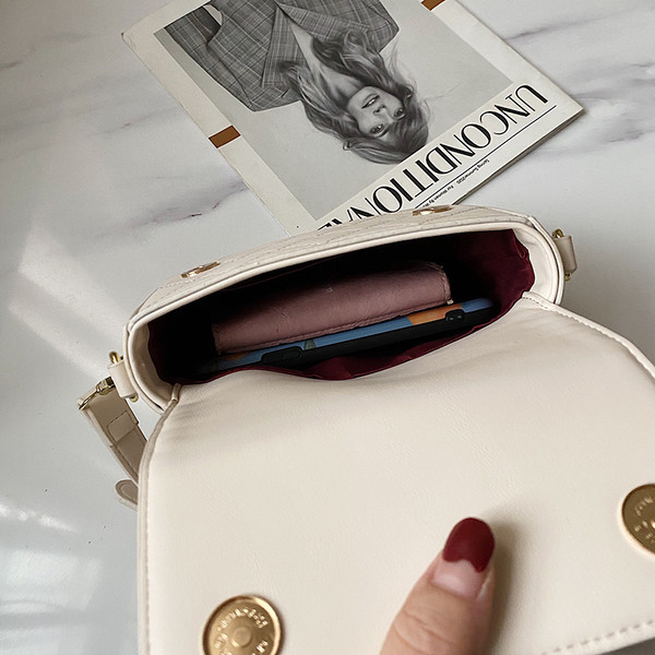 Stílusos női kis táska hosszú füllel