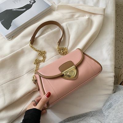 Modern női táska eko bőrből, csattal