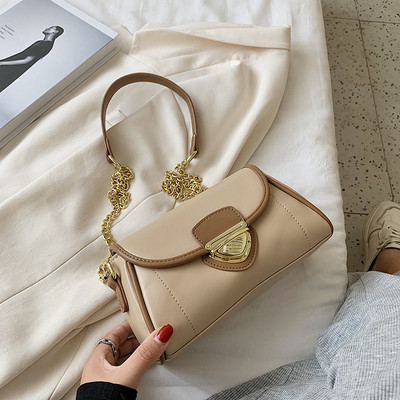 Modern női táska eko bőrből, csattal