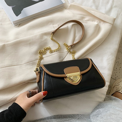 Modern női táska eko bőrből, csattal