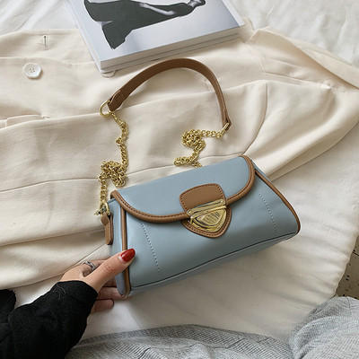 Modern női táska eko bőrből, csattal