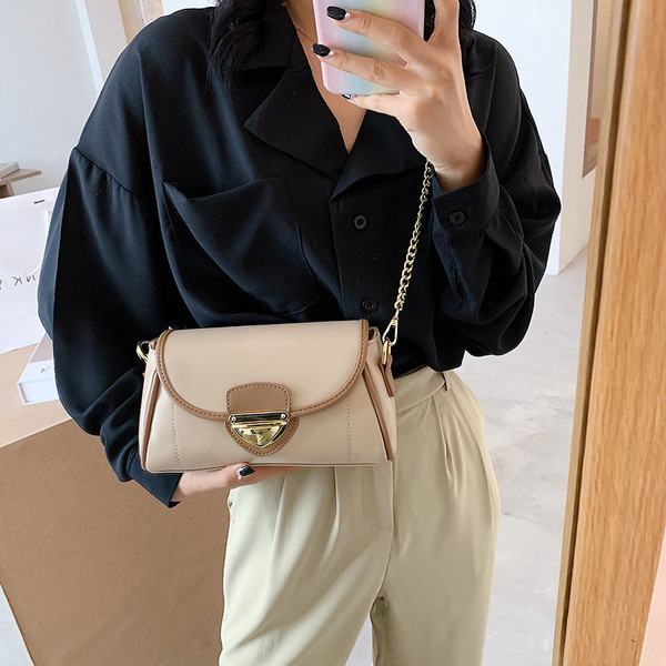 Modern női táska eko bőrből, csattal