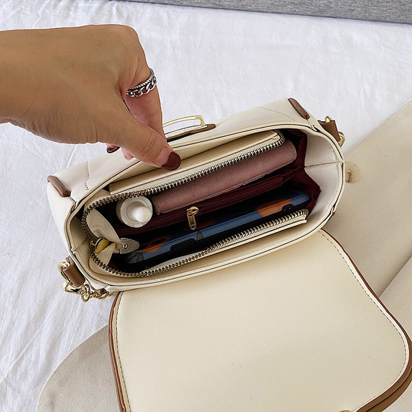 Modern női táska eko bőrből, csattal