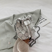 Dnevna ženska torba s dugom ručkom i ušicama