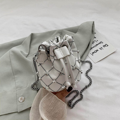 Dnevna ženska torba s dugom ručkom i ušicama