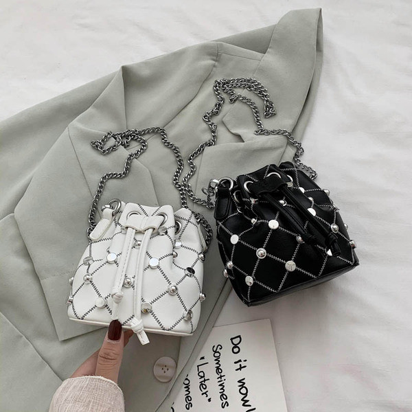 Dnevna ženska torba s dugom ručkom i ušicama