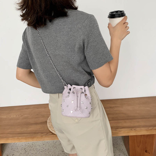 Dnevna ženska torba s dugom ručkom i ušicama