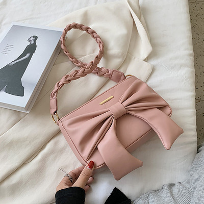 Moderna ženska torba na rame s trakom